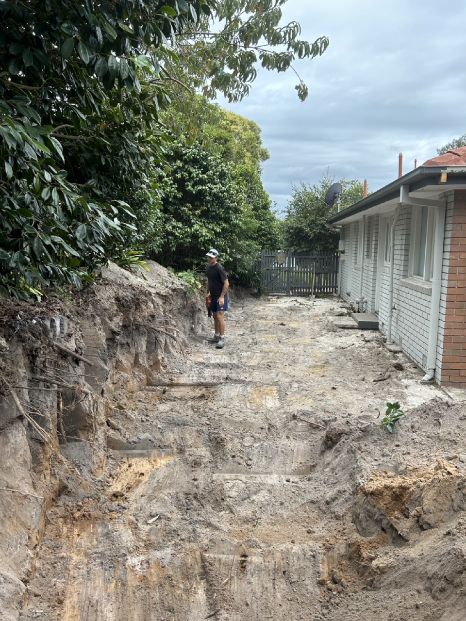 Retaining wall and reshaped levels in backyard
