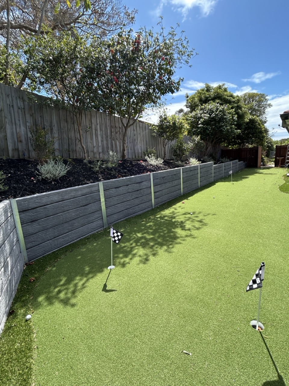 Completed backyard putting green transformation