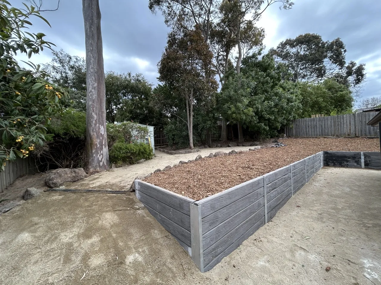 Rebuilt retaining and cleaner backyard structure