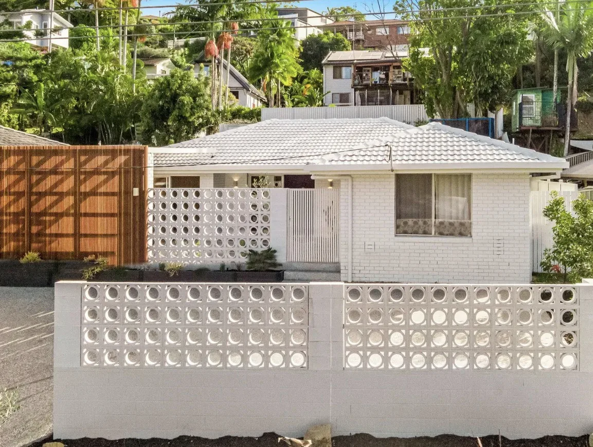 McRae Palm Beach style front yard project by DT Masonry Scapes